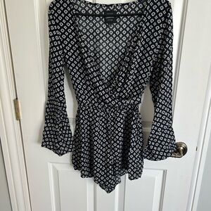 Elegant Black and White Wrap Top